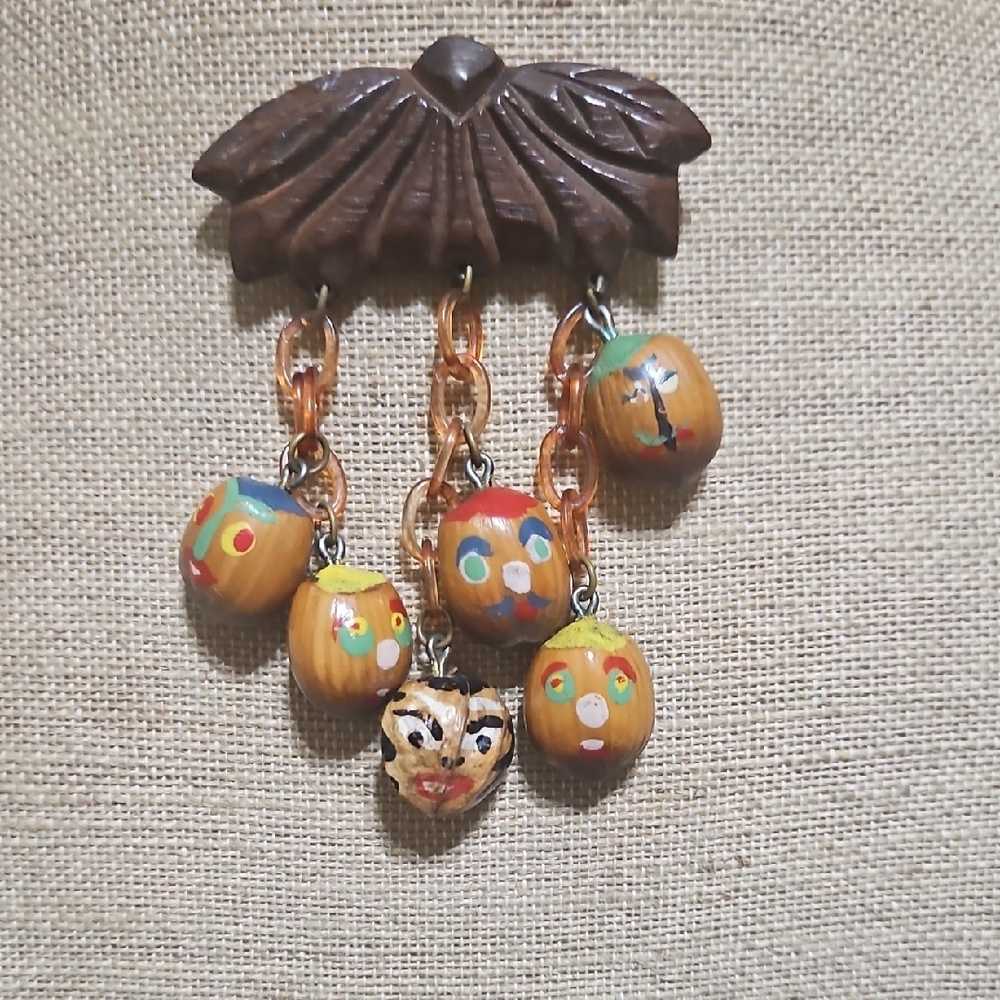 Vintage Handcrafted Wooden Bead Pendant with Faces And Celluloid Chain